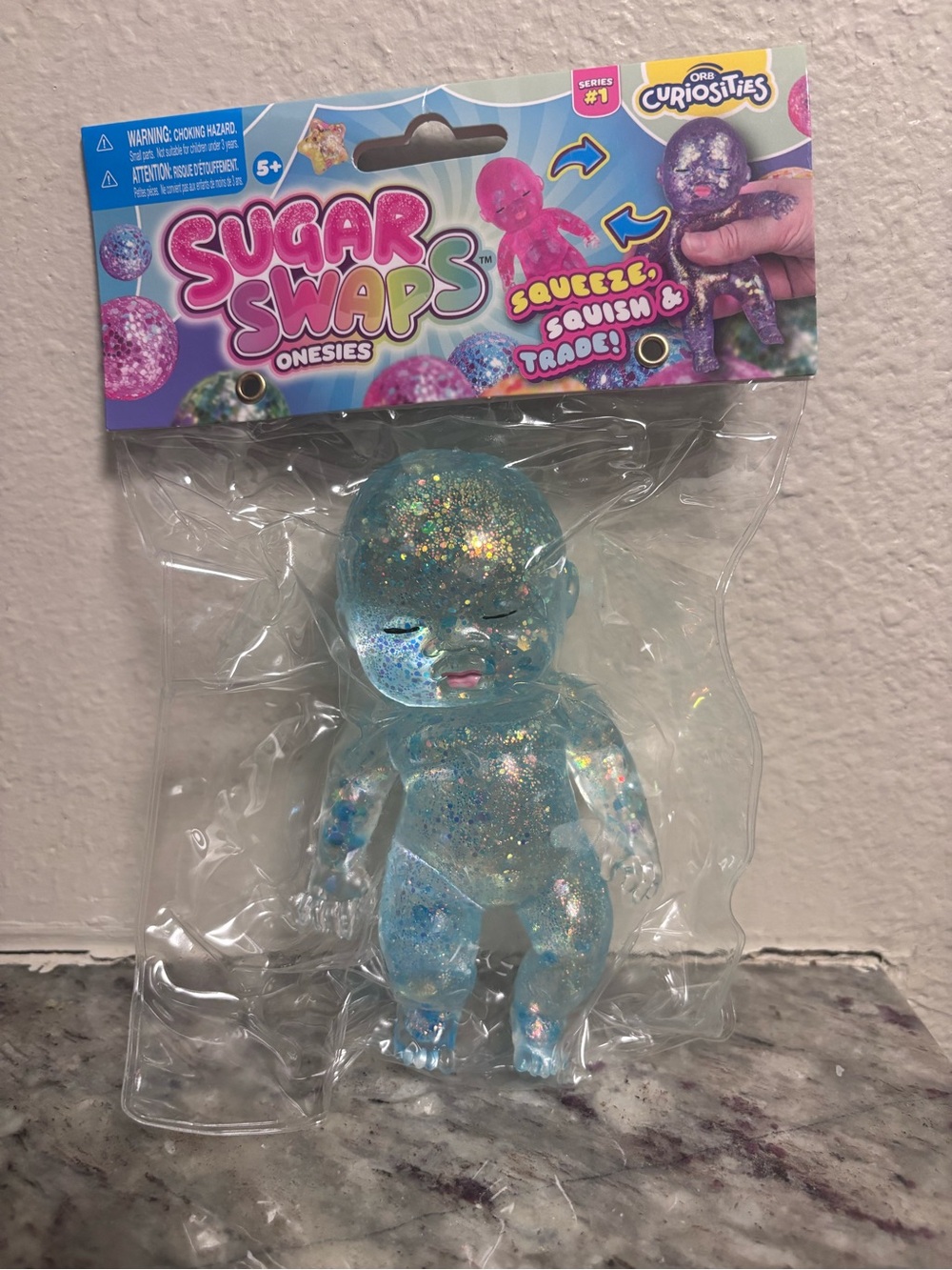 Orb Sugar Swaps Onesies Baby Blue Glitter Squishy